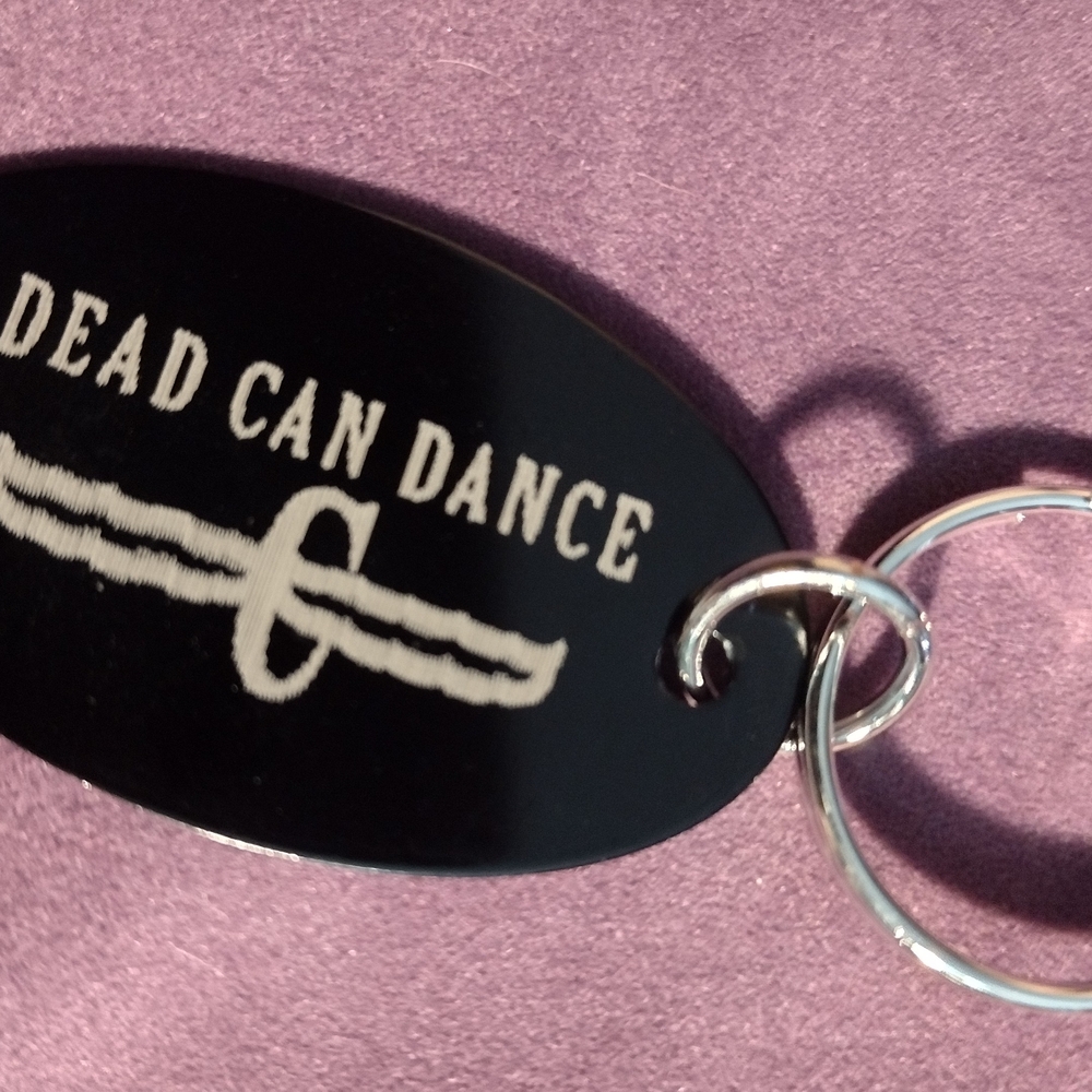 Black Keychain with White Text